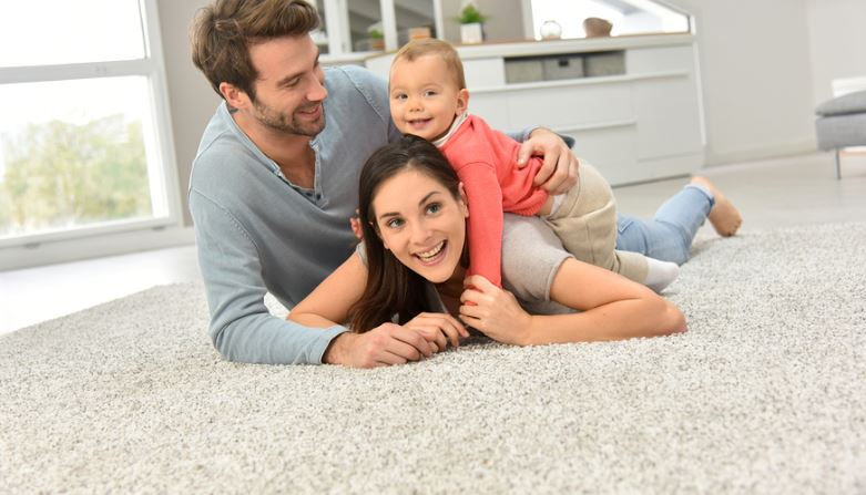 family on carpet